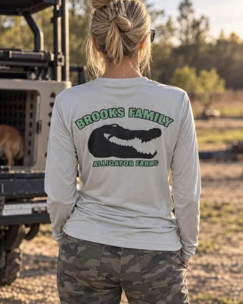 Light gray long-sleeve shirt printed with the Brooks Family Alligator Farms logo
